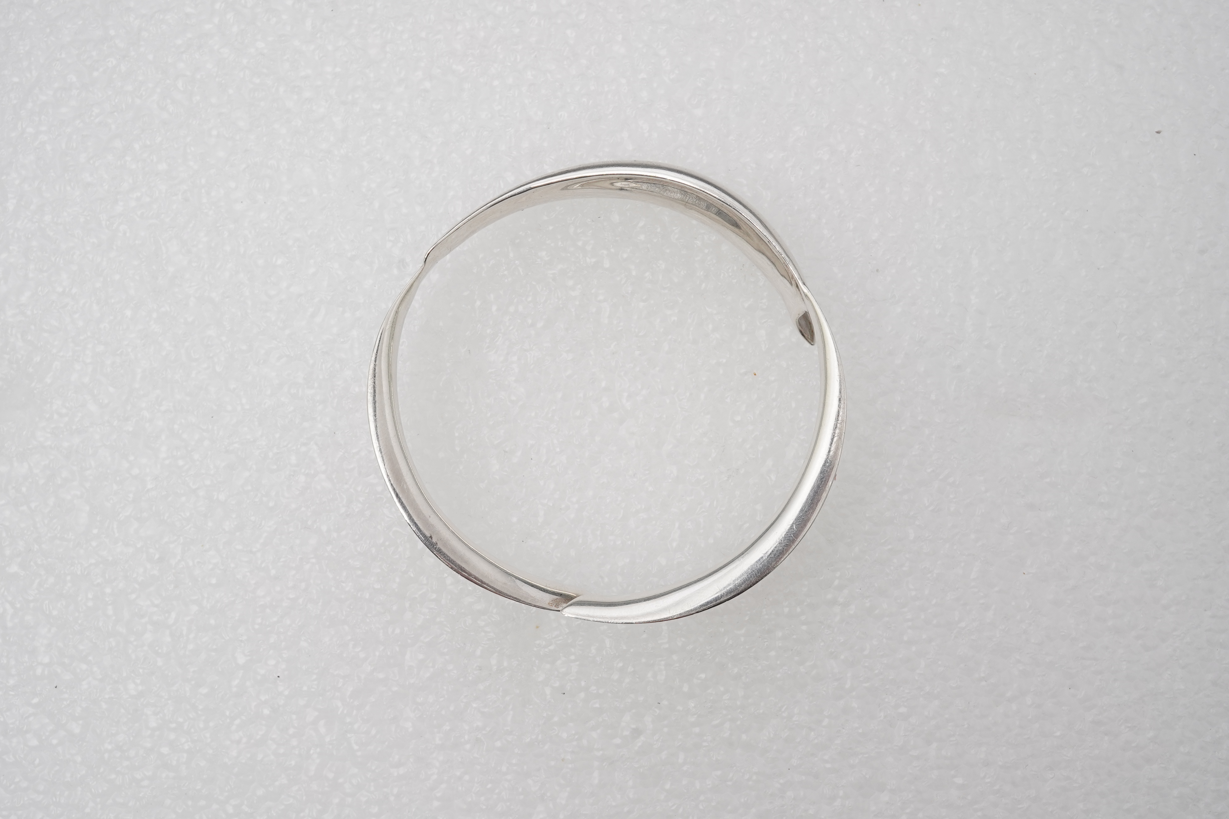 Frank Gehry for Tiffany & Co., a silver 'Fish' bangle, circa 2008